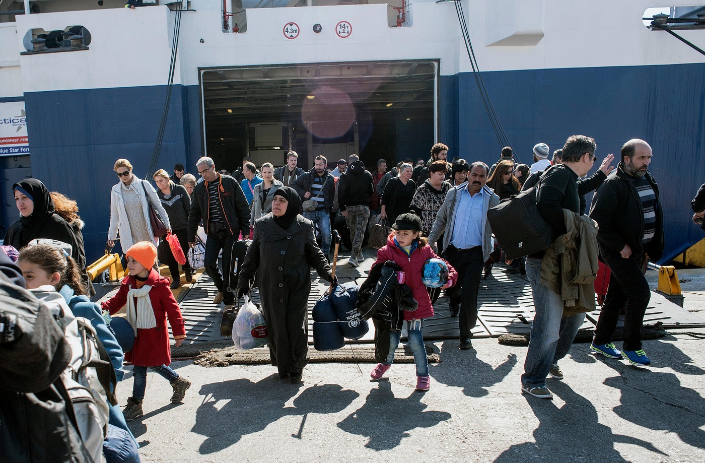 Migranti prispejo v Atene