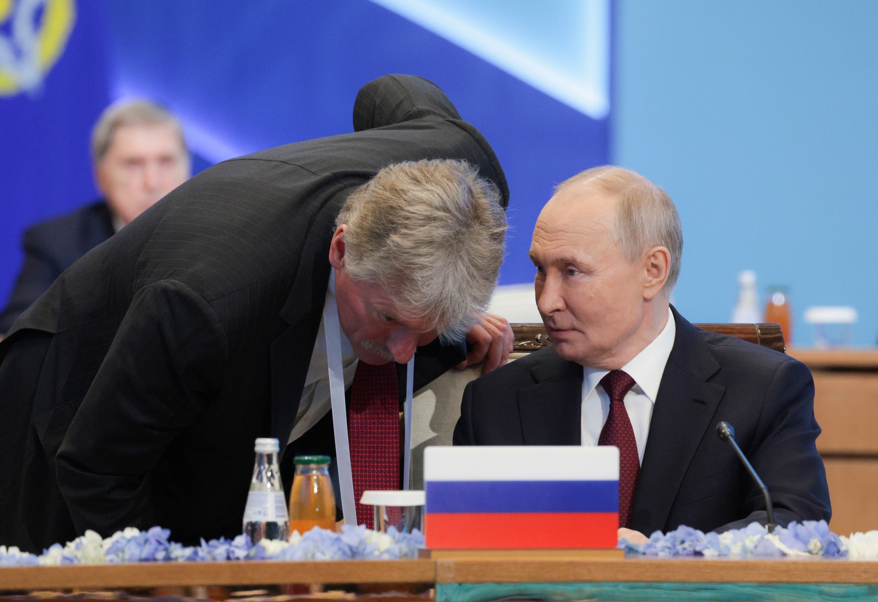 Dmitrij Peskov in Vladimir Putin