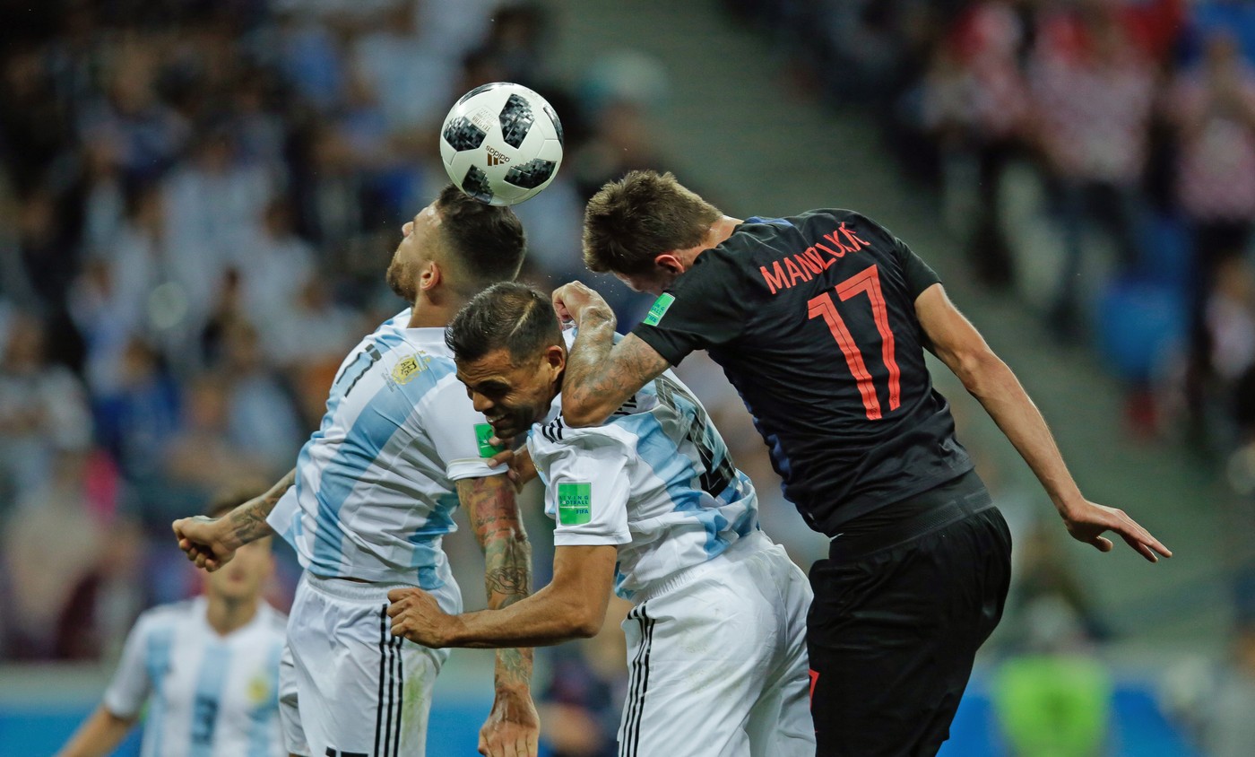 From left: Nicolas Otamendi and Gabriel Mercado of Argentina right Mario Mandzukic of Croatia during the FIFA World Cup 2018 Group D Argentina v Croatia match at the Nizhny Novgorod Stadium, Nizhny Novgorod, Russia, June 21, 2018.,Image: 375984520, Licens