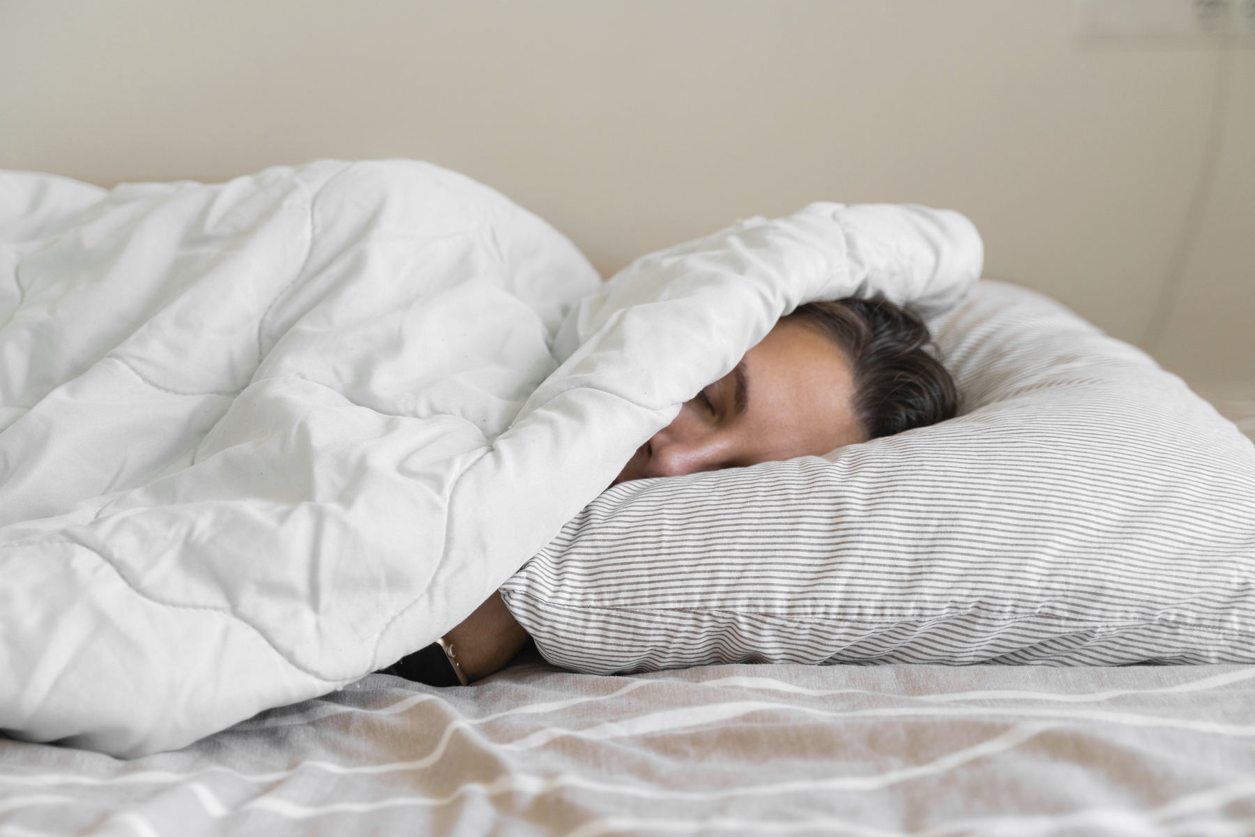 Young millennial woman sleeping covered with blanket. Cold winter. No heating at home. Loud snoring. Sweet dreams. Circadian cycles.,Image: 1014751528, License: Royalty-free, Restrictions: , Model Release: yes