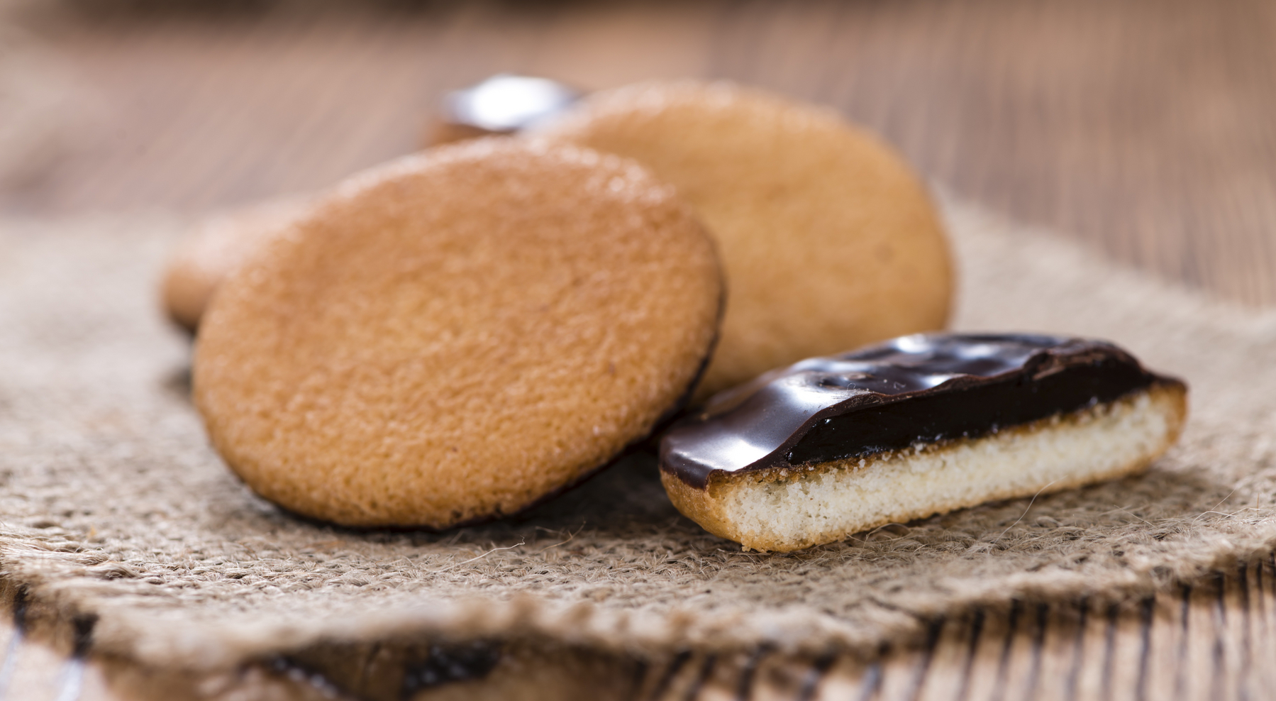 Some Jaffa Cakes (close-up shot) on rustic wooden background,Image: 1016199918, License: Royalty-free, Restrictions: , Model Release: no