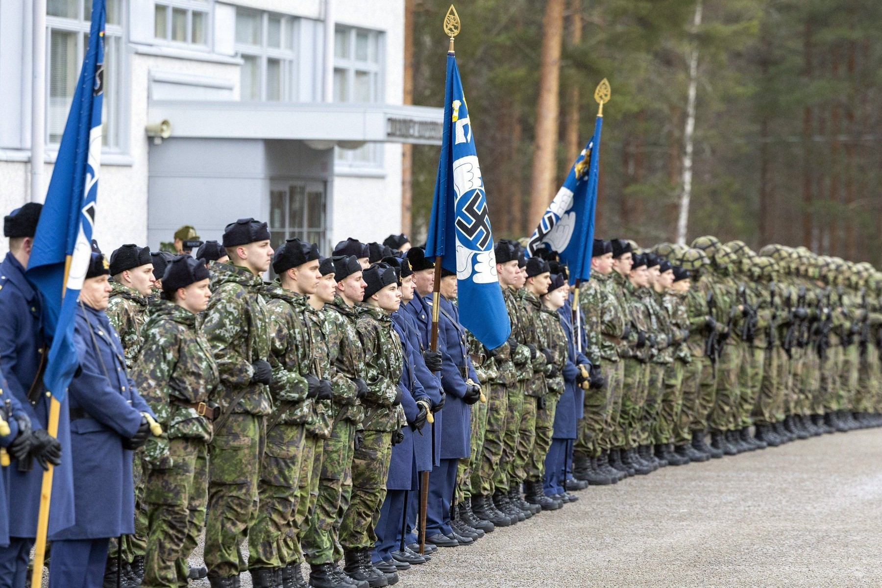 Flags of Finnish Air Forces during a parade in Jyväskylä, November, 2024.