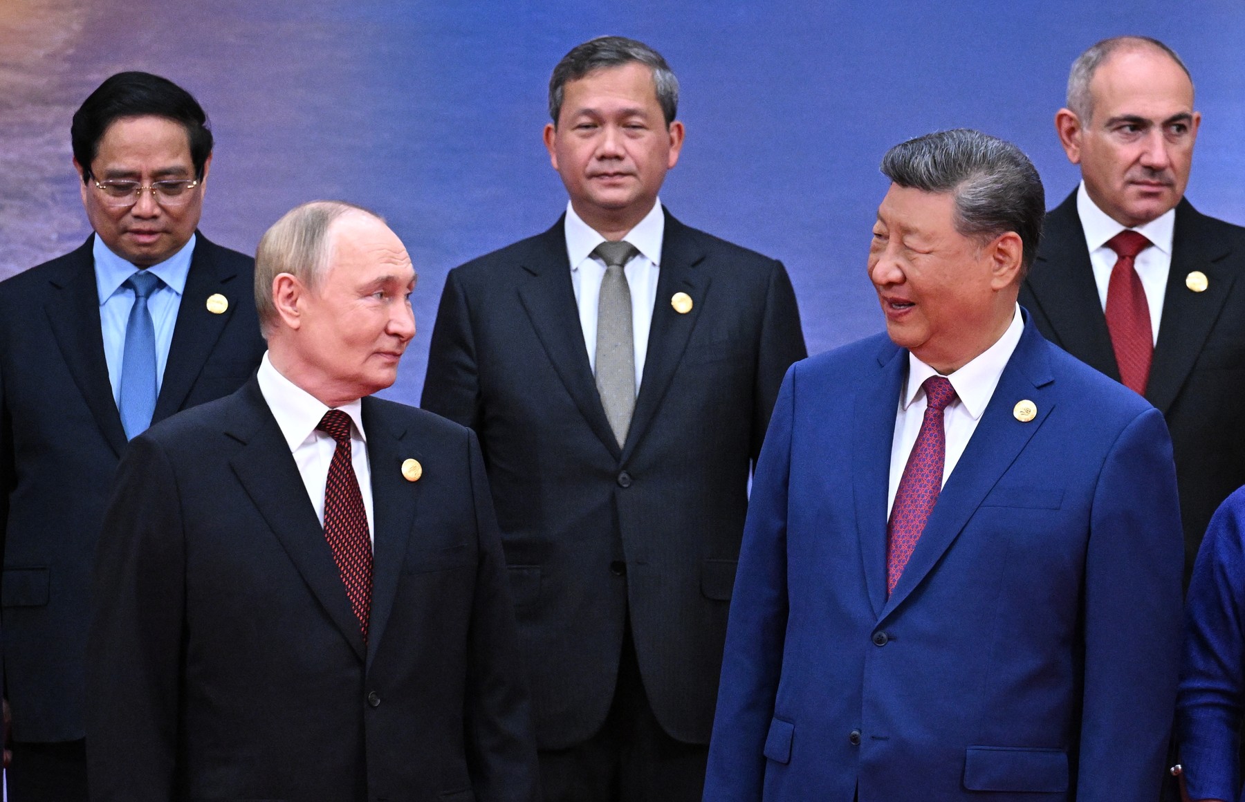 Vladimir Putin and Chinese President Xi Jinping attend a family photo opportunity during a ceremony to welcome Heads of States of the SCO (Shanghai Cooperation Organisation) in Tianjin, China
