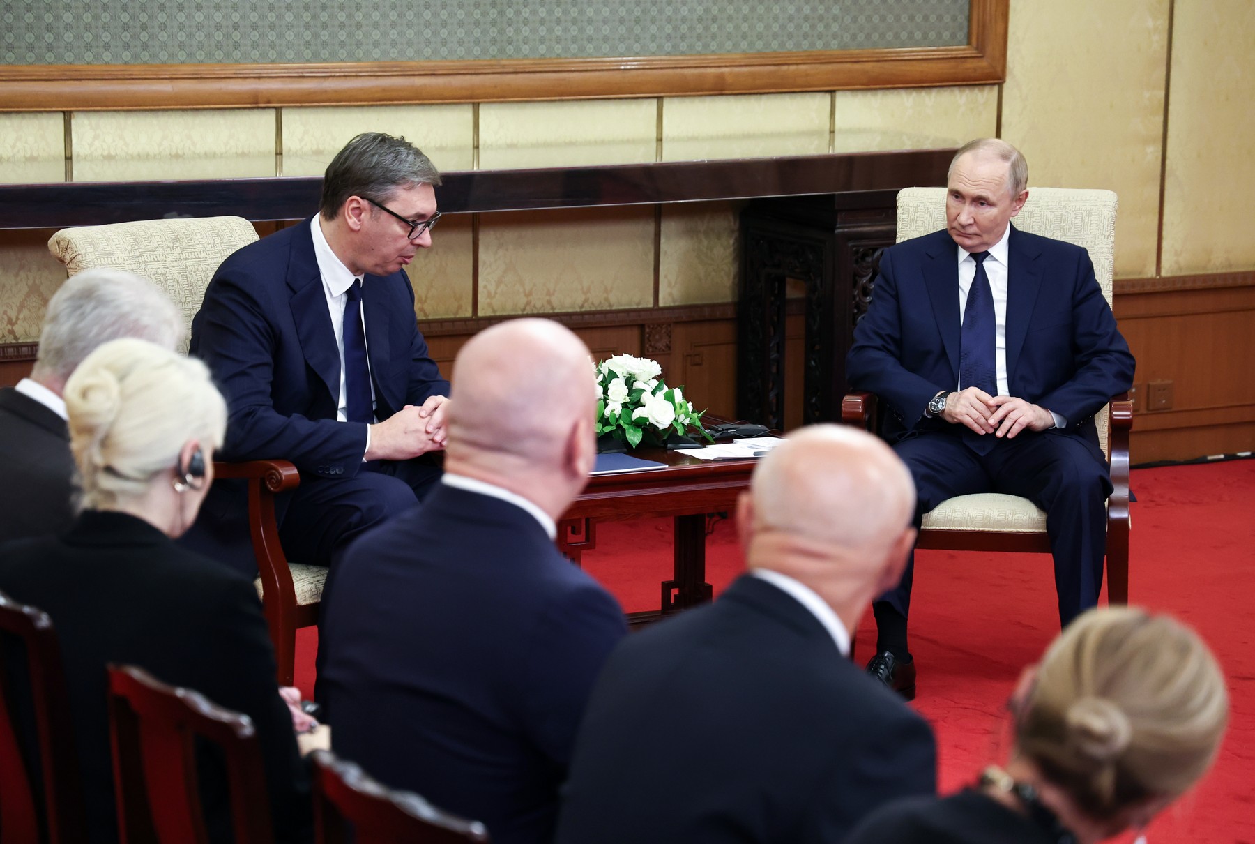 Aleksandar Vucic andVladimir Putin attend a meeting at Diaoyutai State Guesthouse