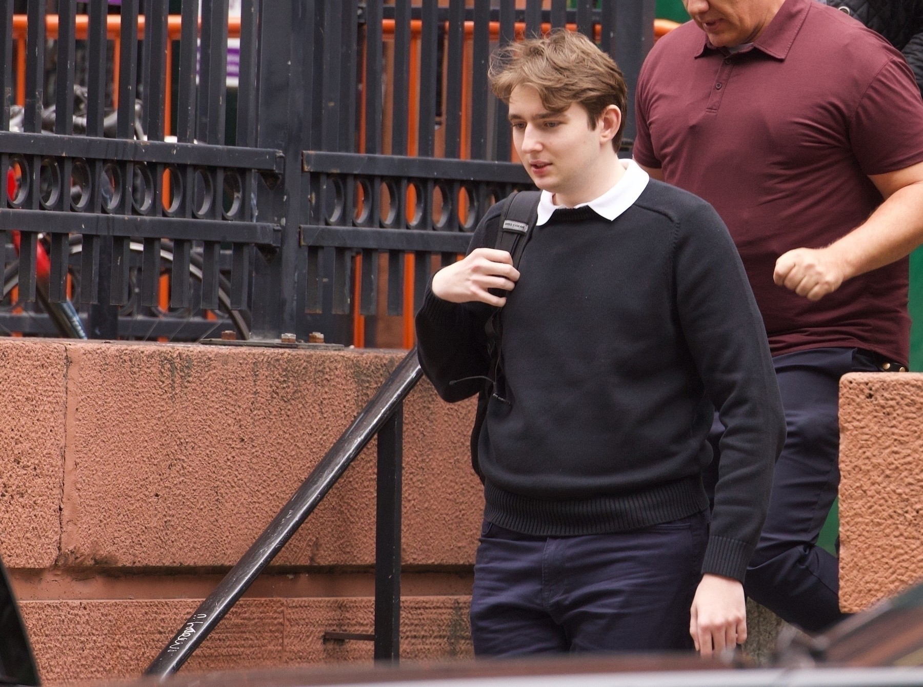 New York, NY Barron Trump Towers Over His bulletproof Secret Service SUV, leaving Class at NYU.  Barron Trump