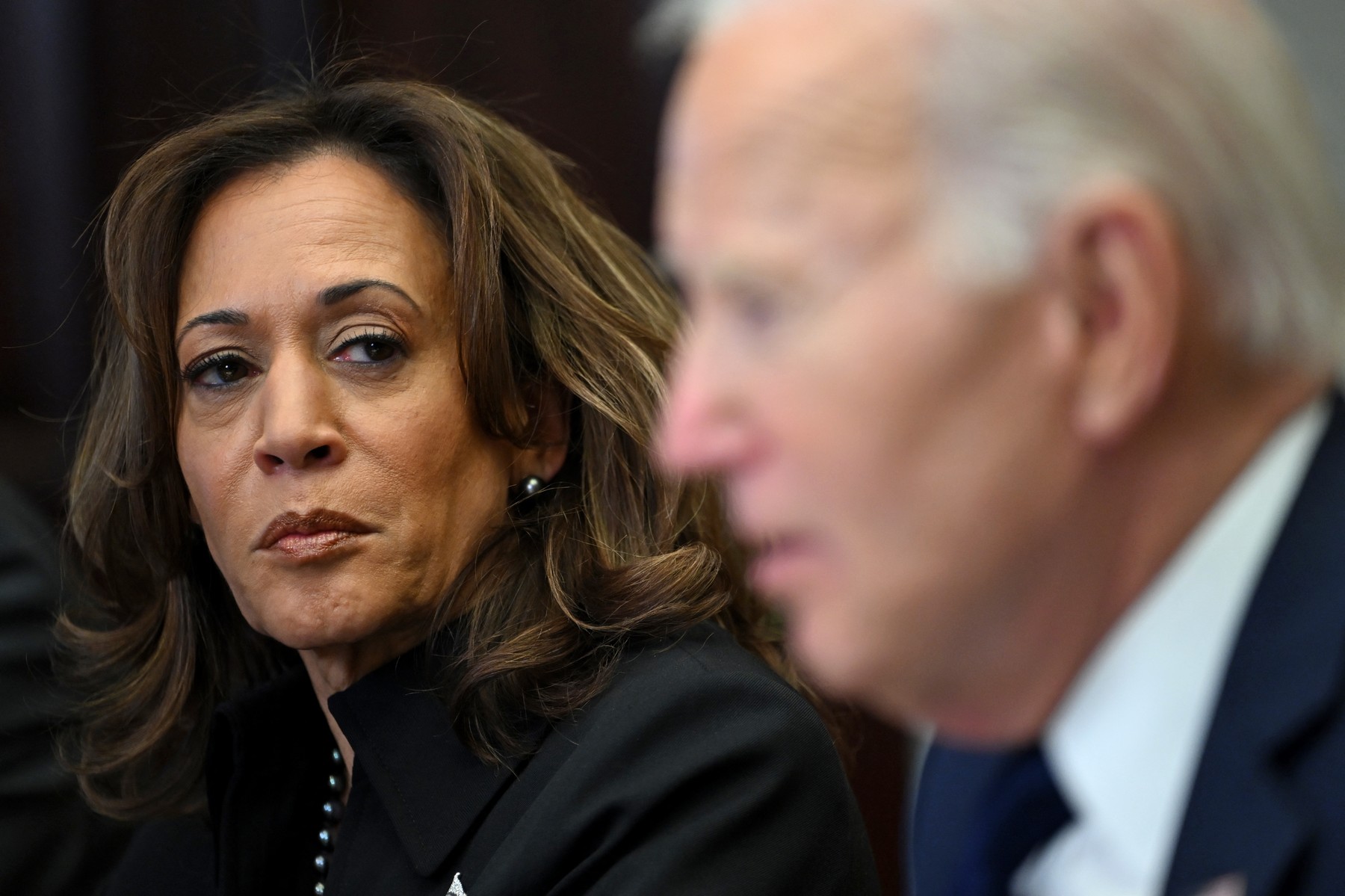 (FILES) US Vice President Kamala Harris listens to US President Joe Biden
