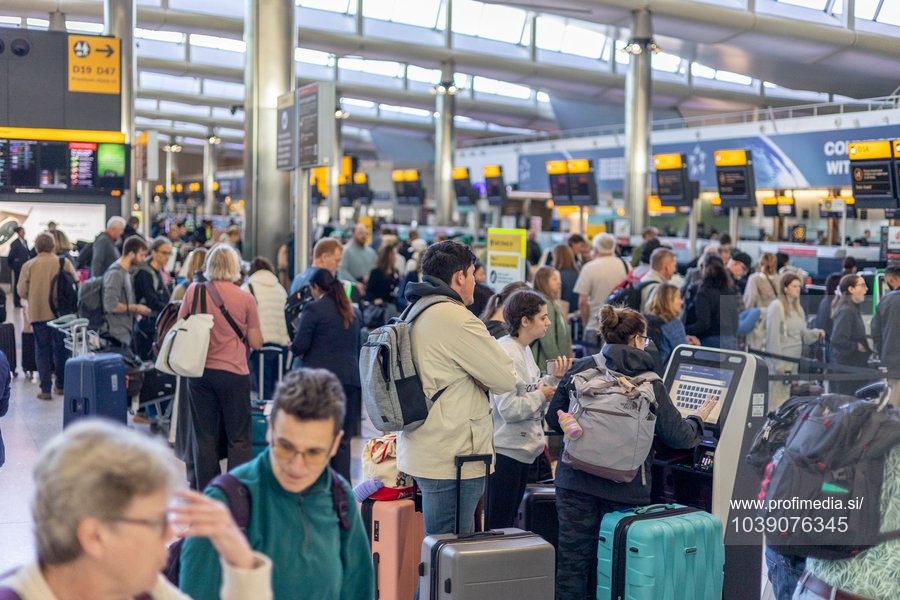 Passengers at Heathrow Airport's Terminal 2 in west London as travel chaos continues