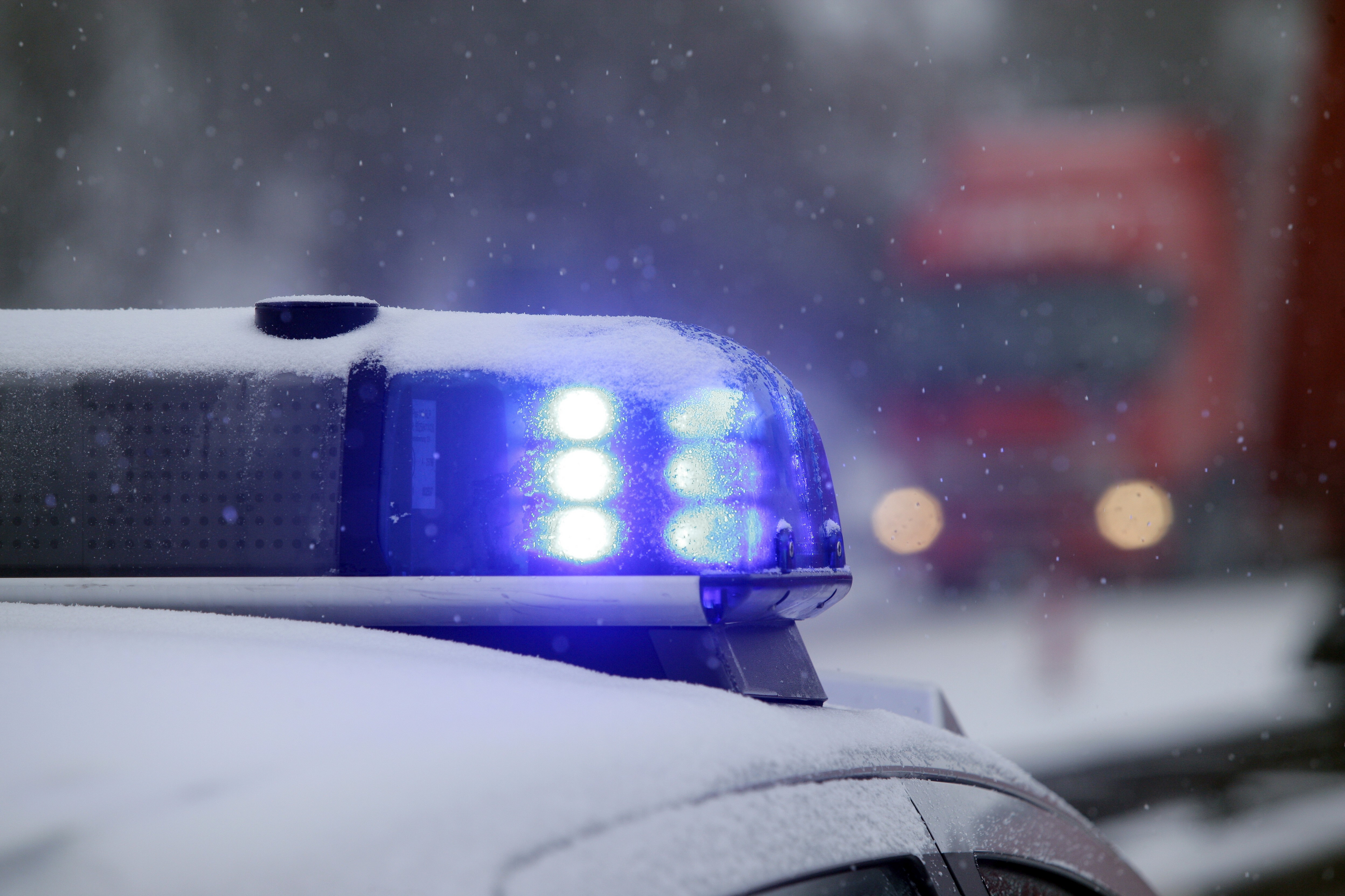 Blue light of a police vehicle in a snow flurry, Rheinboellen, Rhineland-Palatinate, Germany, Europe,Image: 88482155, License: Rights-managed, Restrictions: , Model Release: no