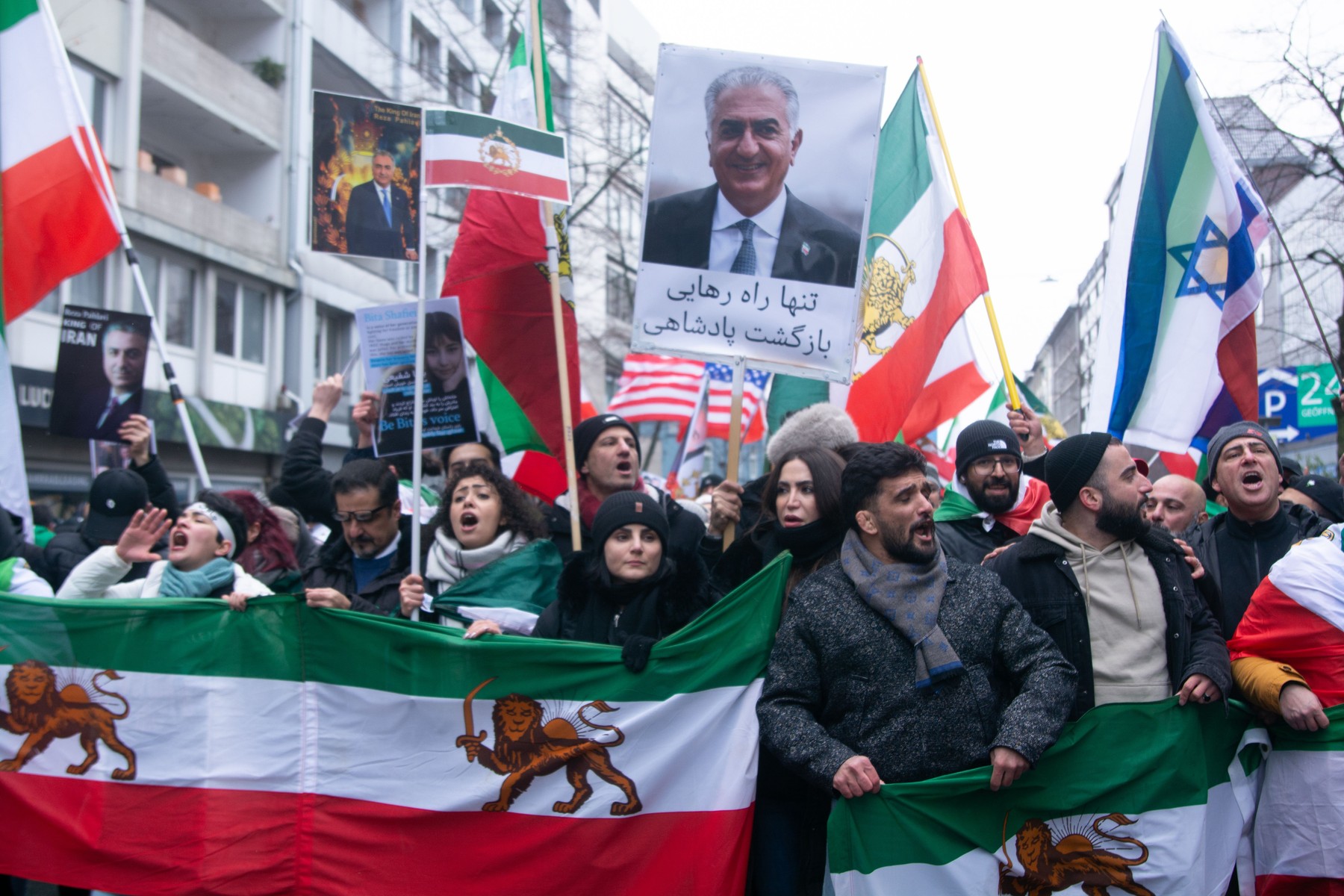 Hundreds of people take part in a protest against the Iranian government and call for regime change as the Crown Prince of Iran, Reza Pahlavi, calls for a worldwide Iranian protest in Duesseldorf, Germany,