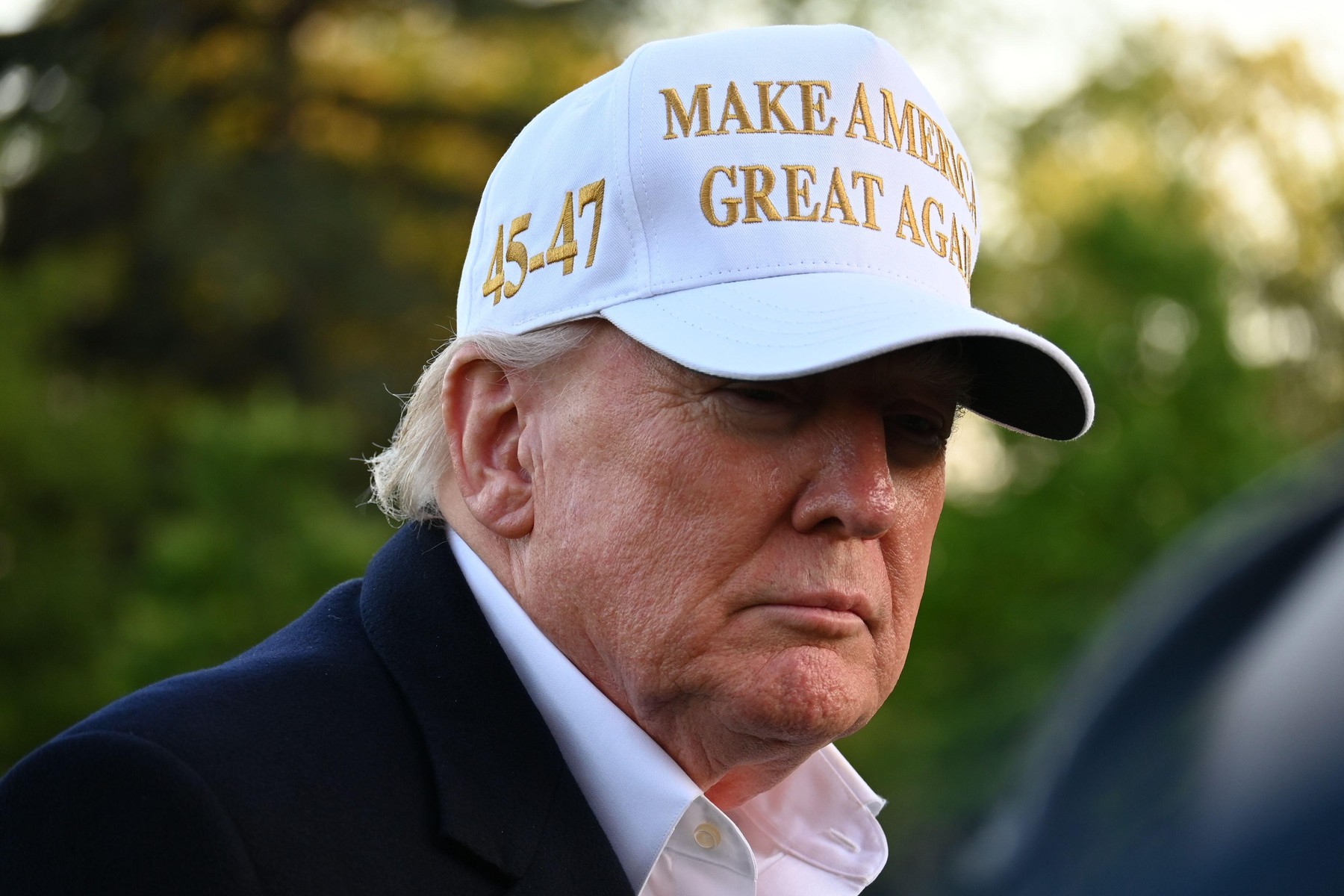 President Trump wearing White Baseball hat