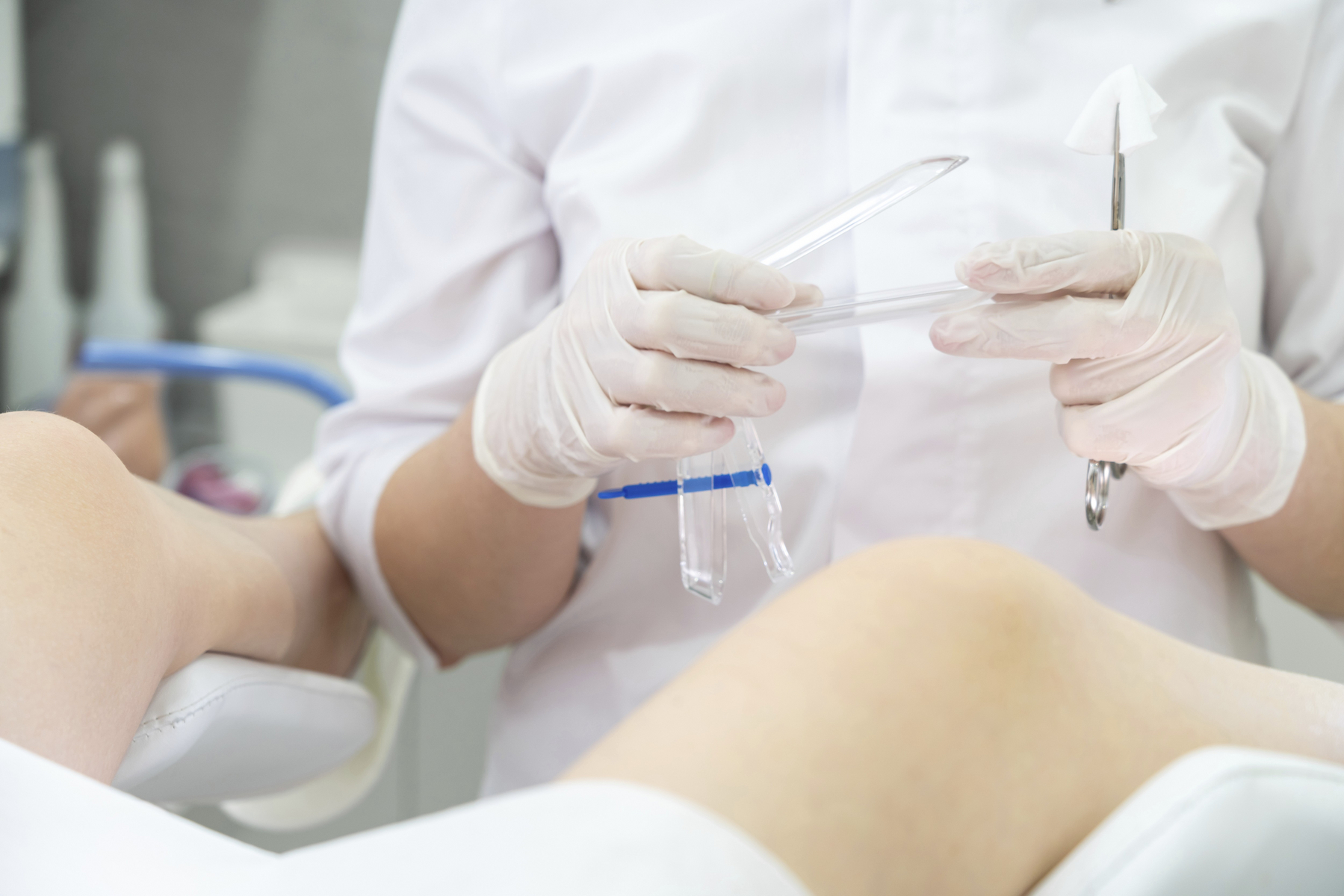 Female gynecologist with vaginal speculum in clinic,Image: 1053284770, License: Royalty-free, Restrictions: , Model Release: yes