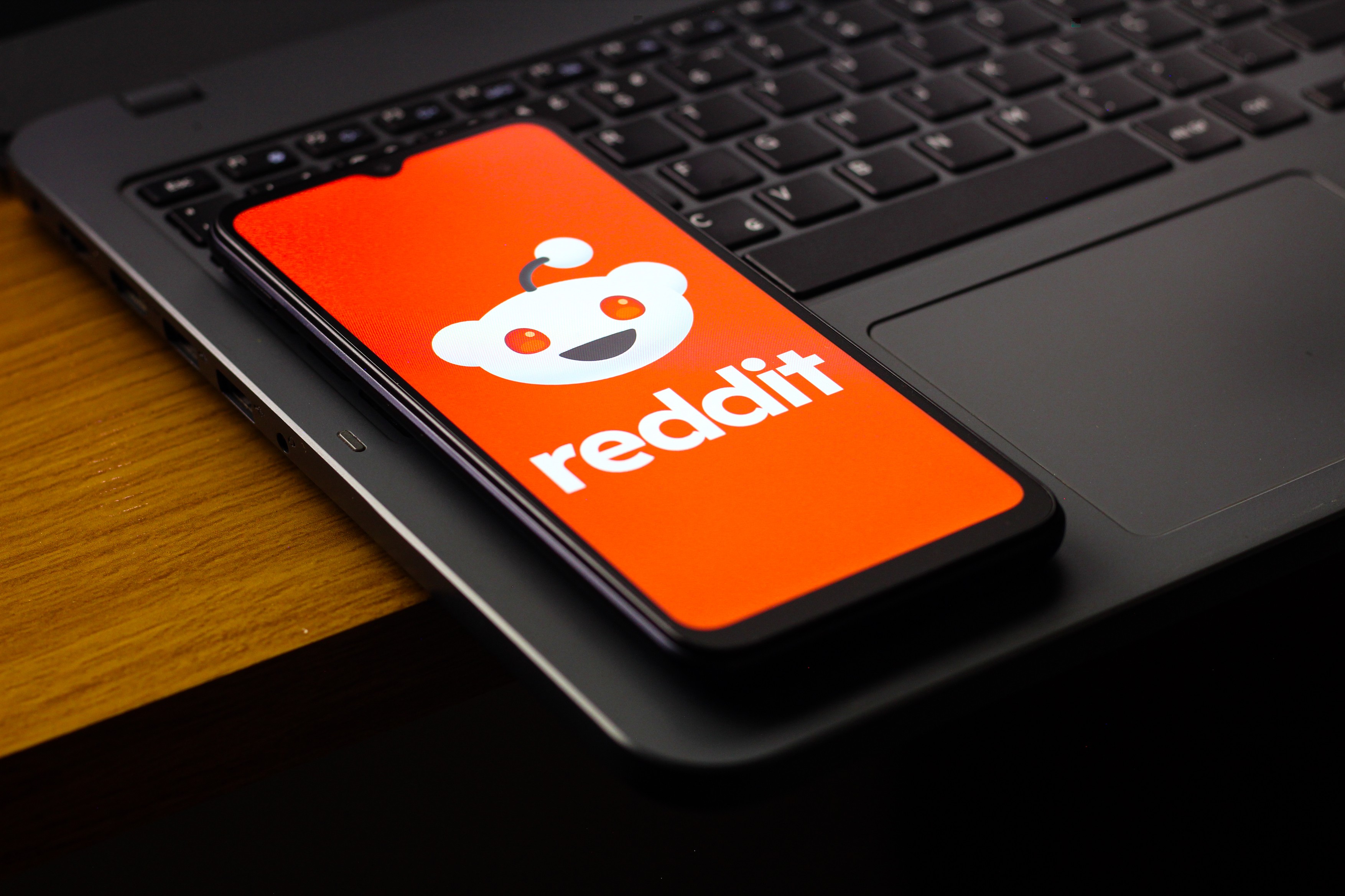 In this photo illustration, the Reddit logo is seen displayed on a smartphone screen.,Image: 1124702803, License: Rights-managed, Restrictions: *** World Rights *** Strictly for editorial news purposes only ***, Model Release: no