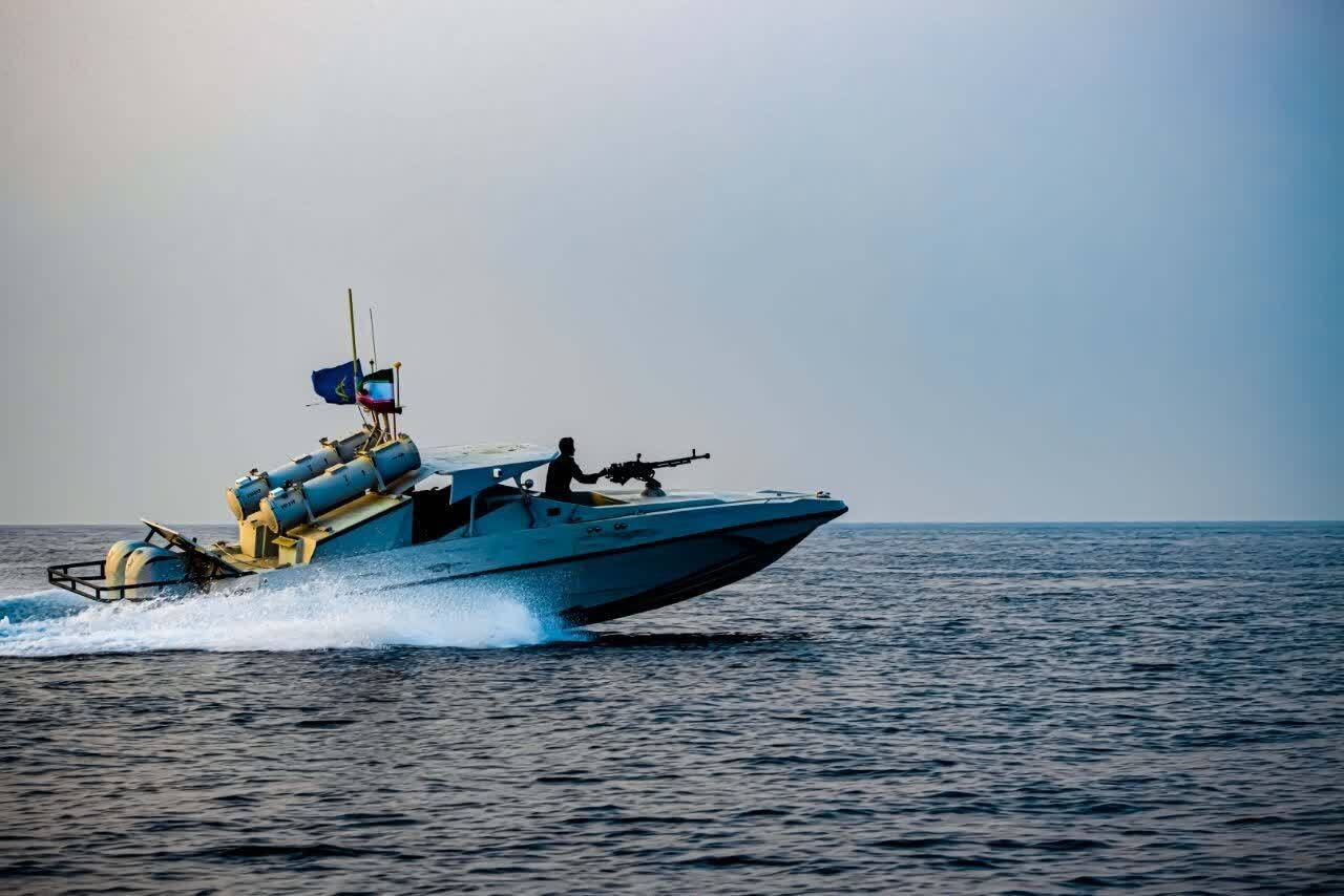 An Islamic Revolutionary Guard Corps (IRGC) fast attack boat takes part in a military drill