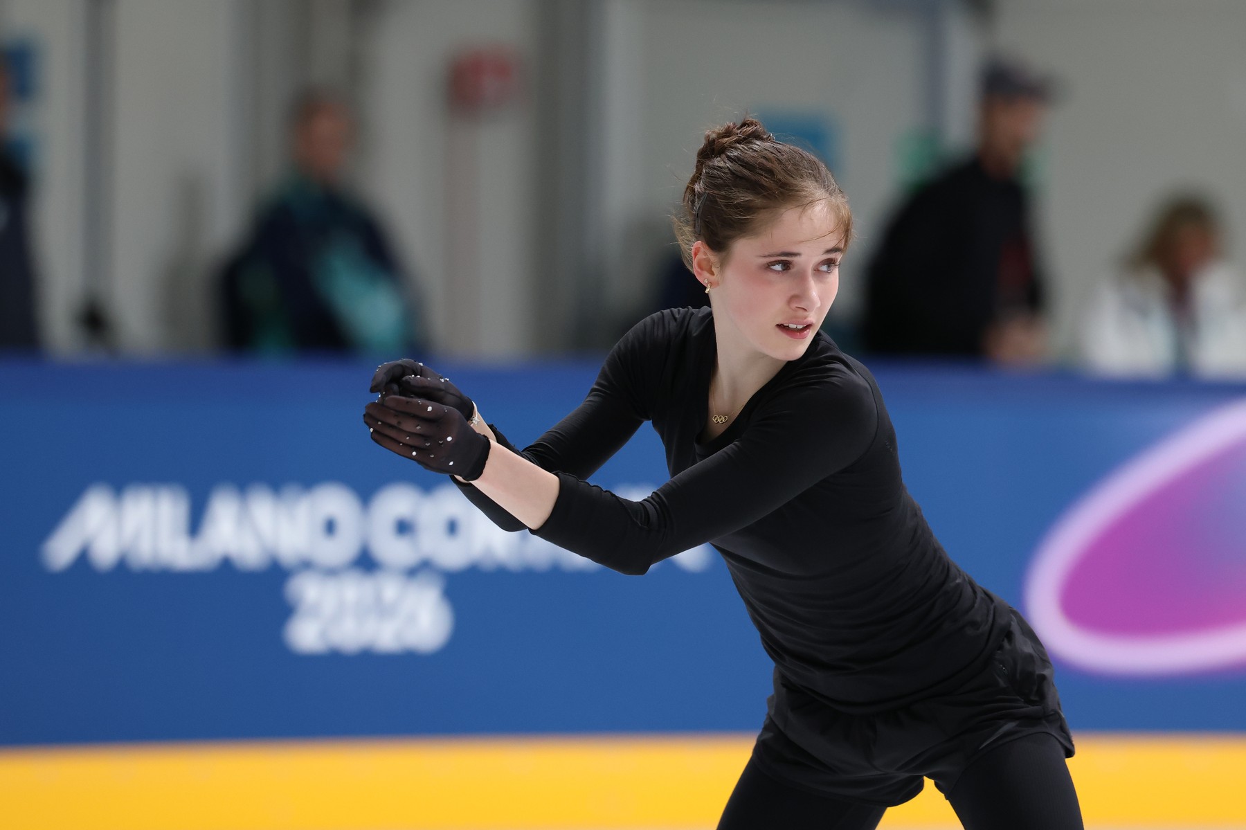 ISABEAU LEVITO of USA wears an olympic rings necklace