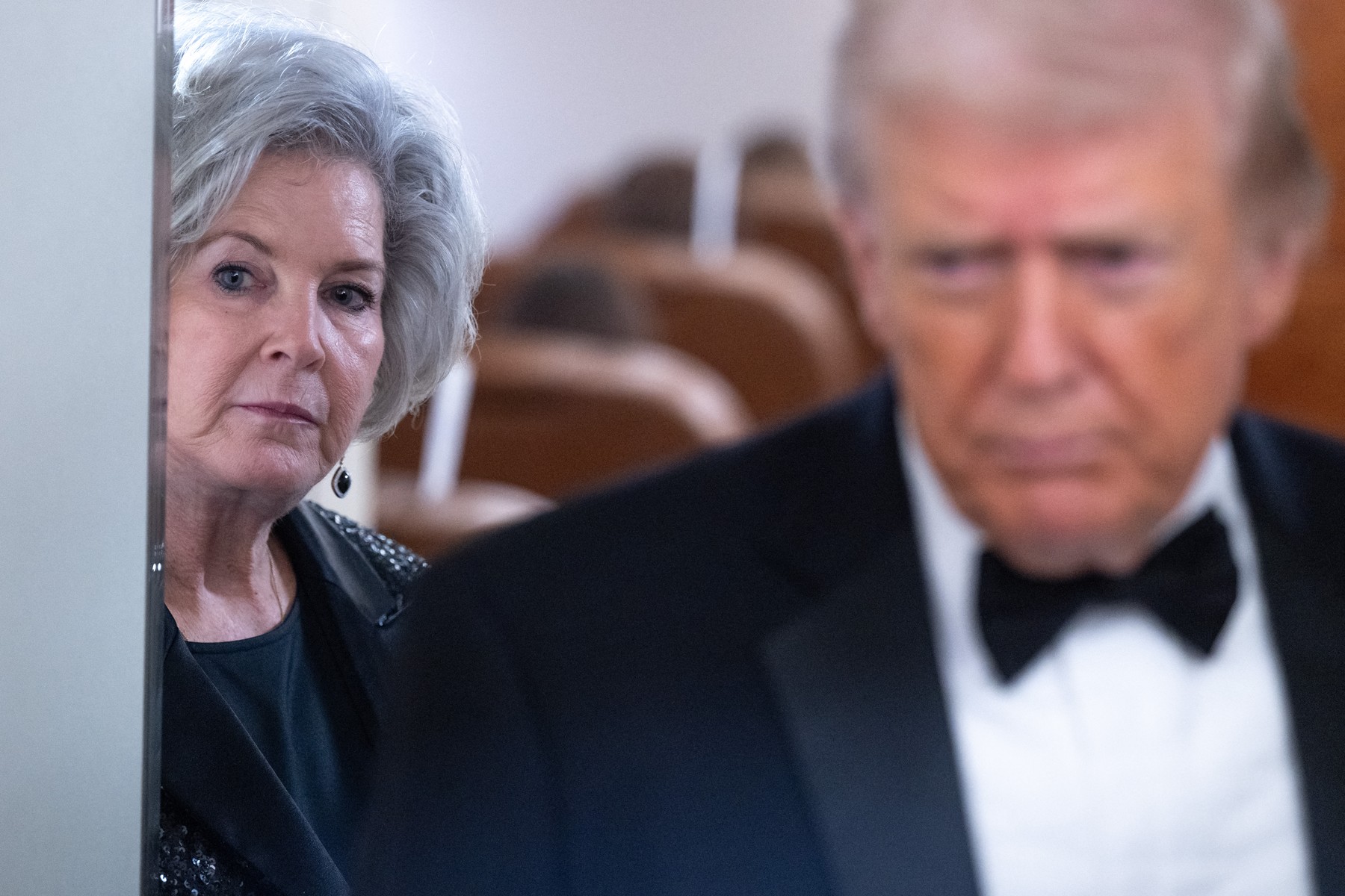 White House Chief of Staff Susie Wiles listens as US President Donald Trump