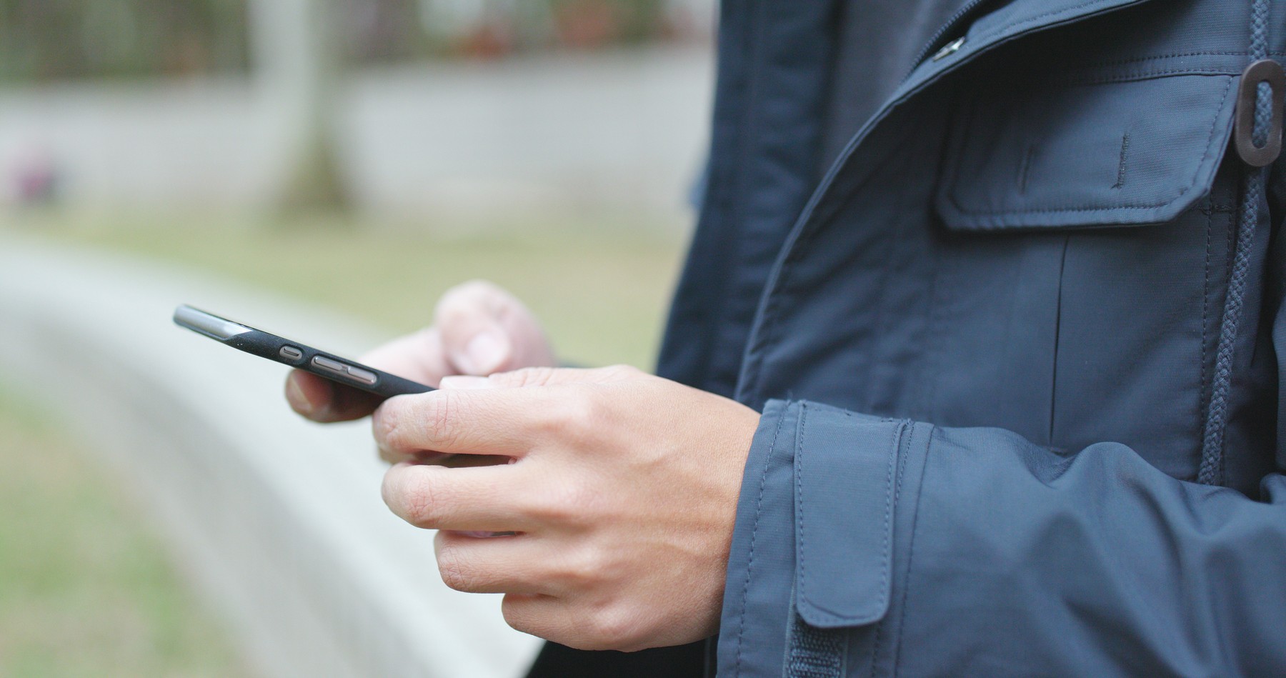 Man use of mobile phone at outdoor