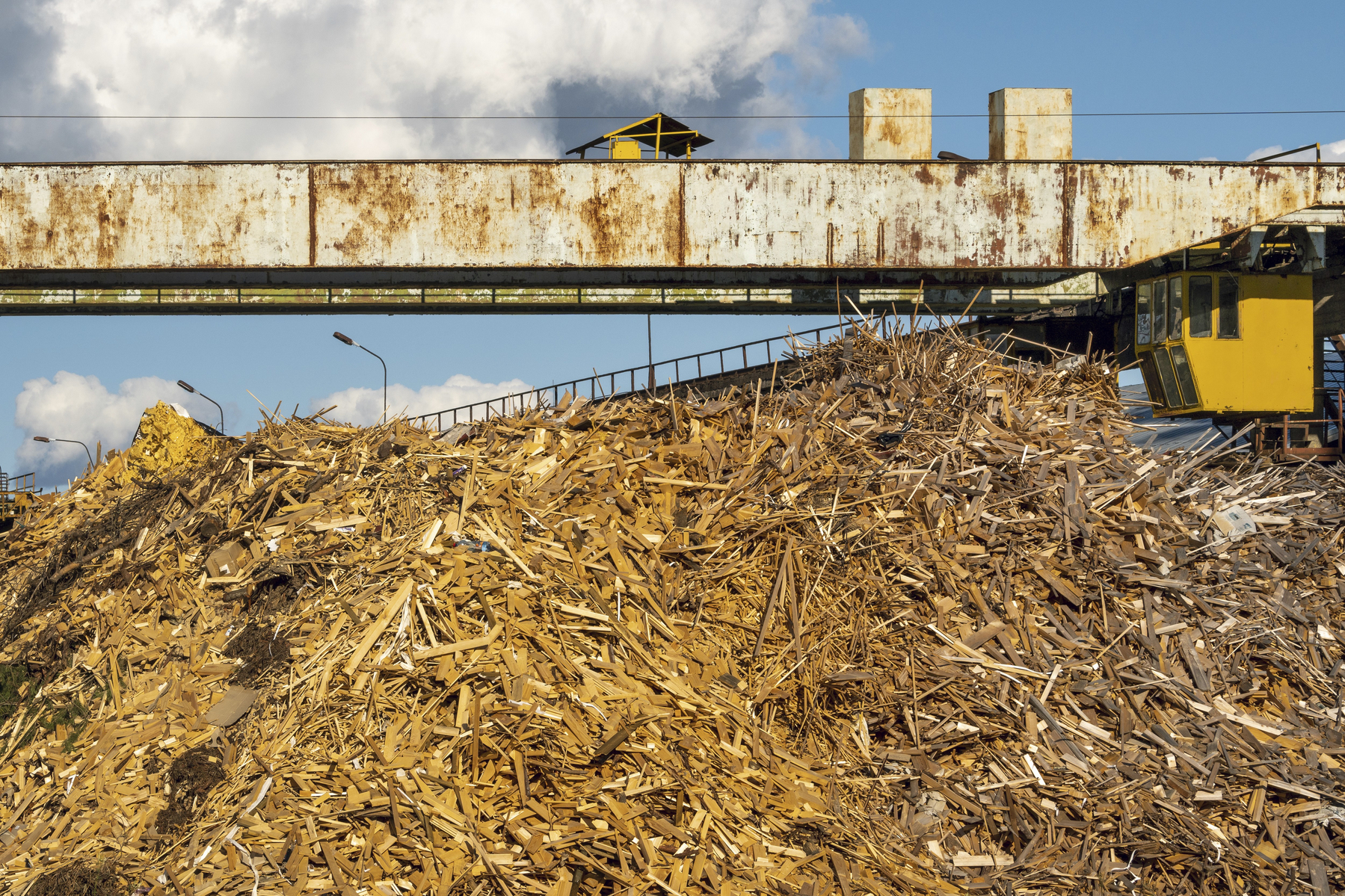 Special equipment machine with crane crush wood. Natural biofuel biomass production plant