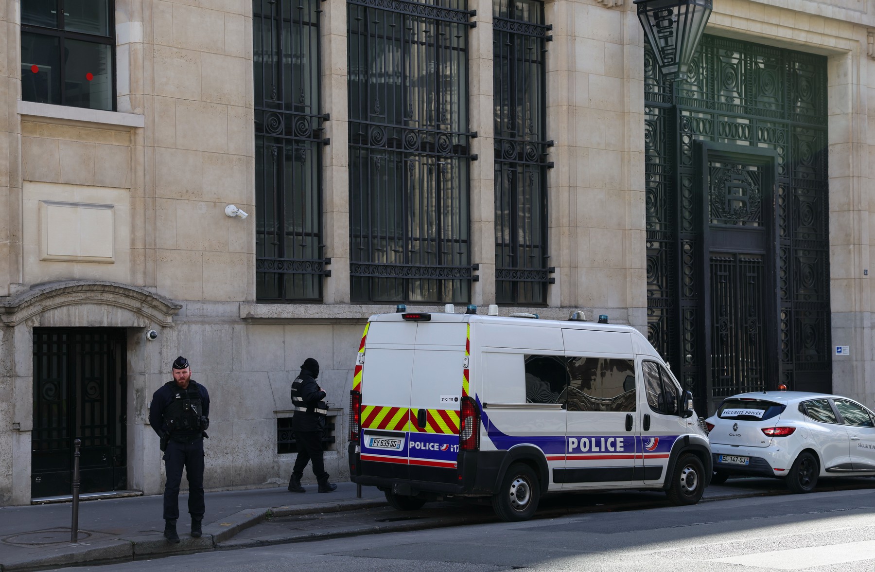 PARIS, March 29, 2026  -- Policemen and police vehicles are seen near the branch of the Bank of America in Paris, France
