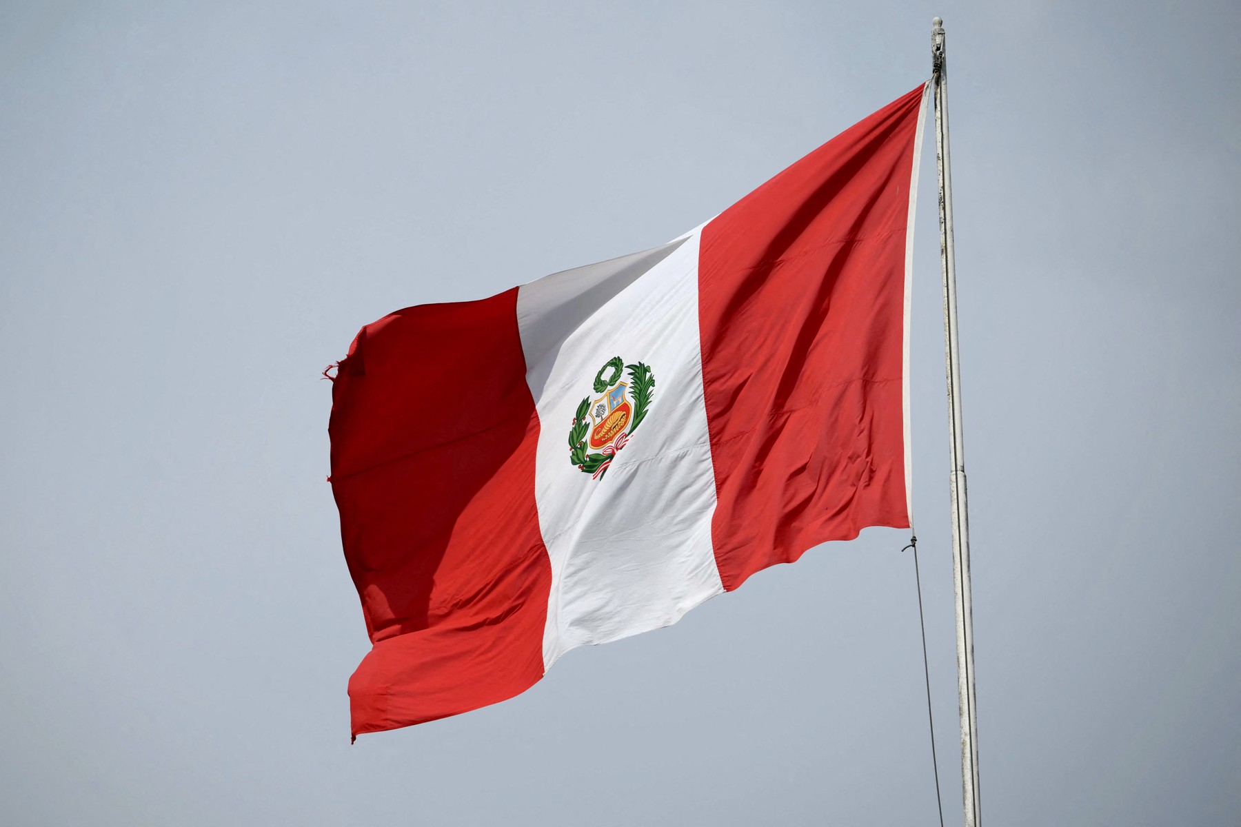 The Peruvian flag waves on top of the Palace of Justice building in Lima on April 7, 2026. Peru will hold presidential elections on April 12, 2026.,Image: 1089331179, License: Rights-managed, Restrictions: , Model Release: no