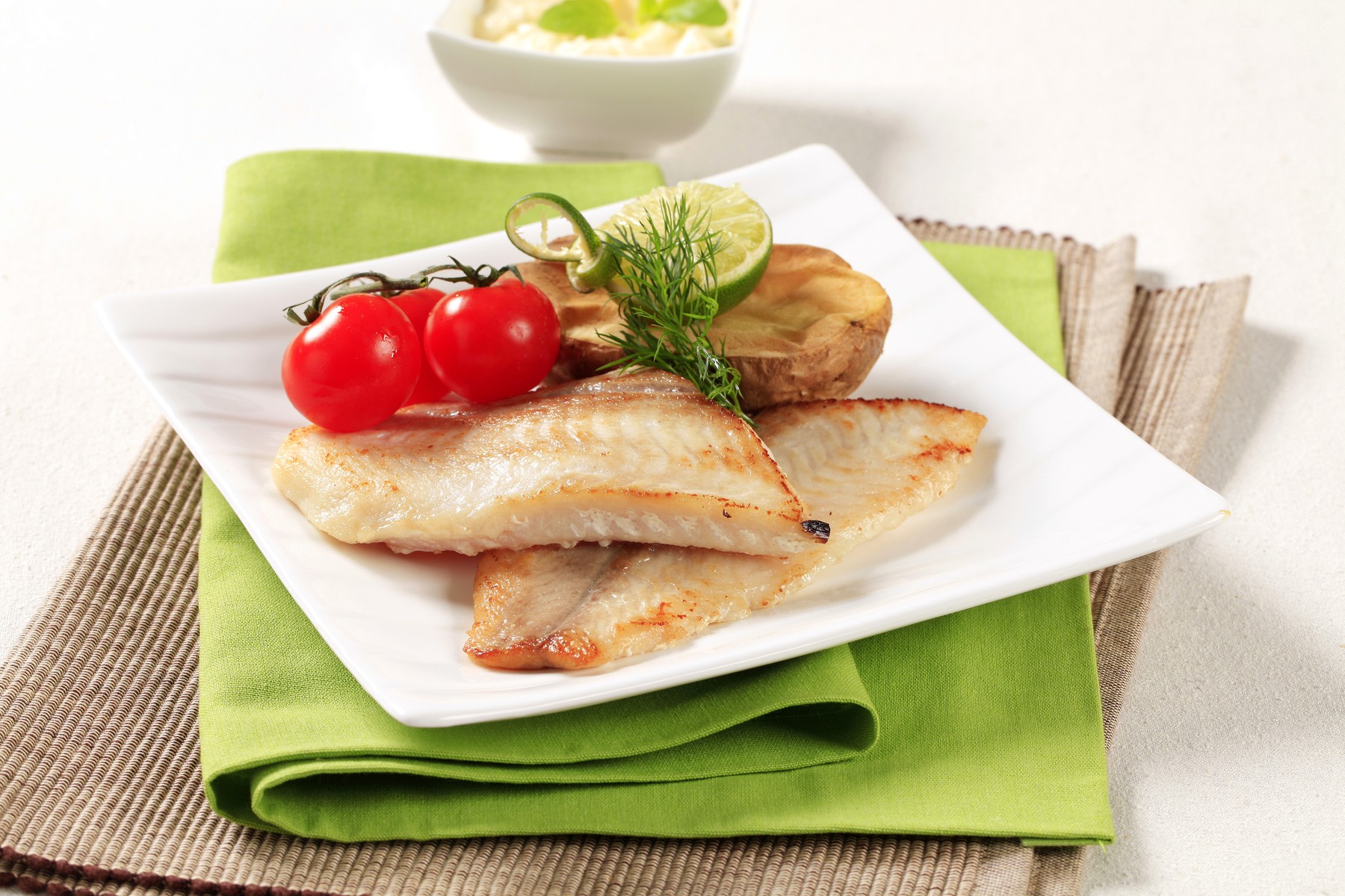 Pan fried fish fillets with roasted potato