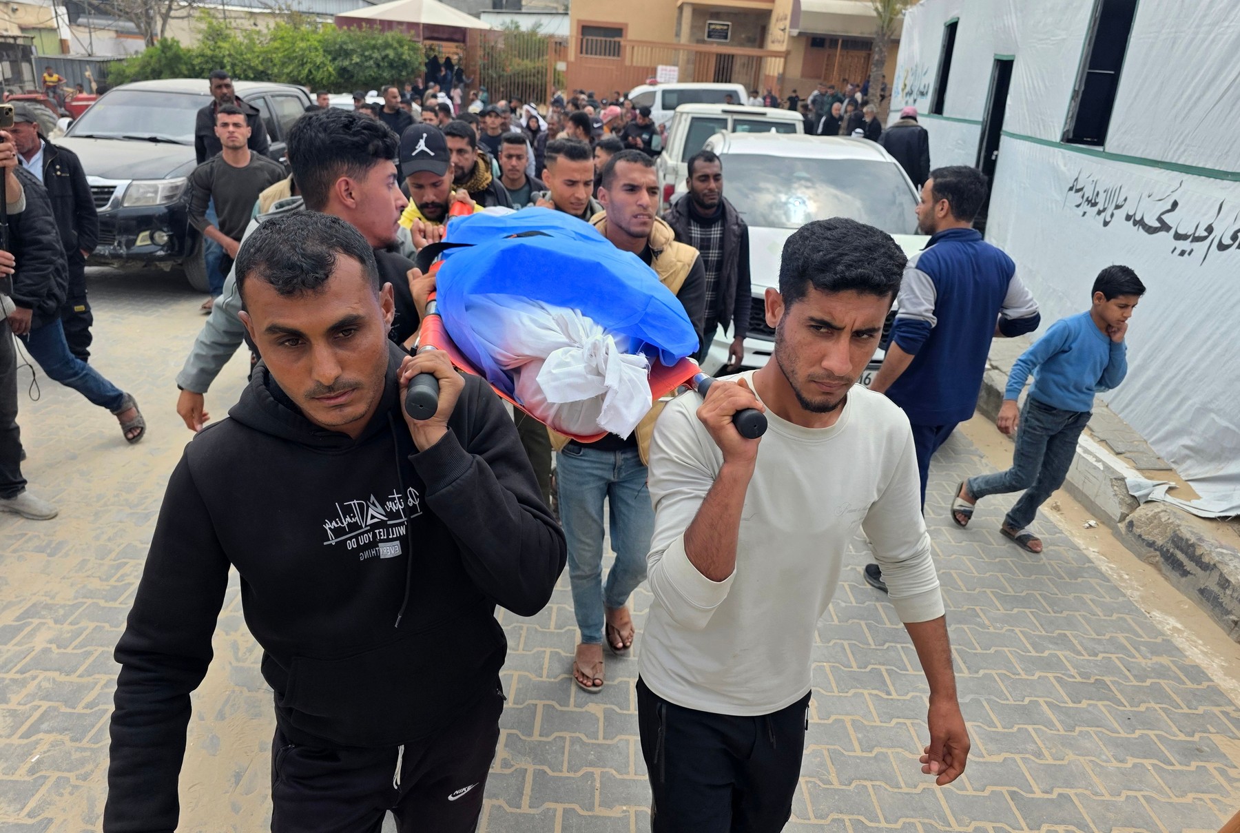 Palestinians mourn the death of Huda al-Attar at Nasser Medical Complex,