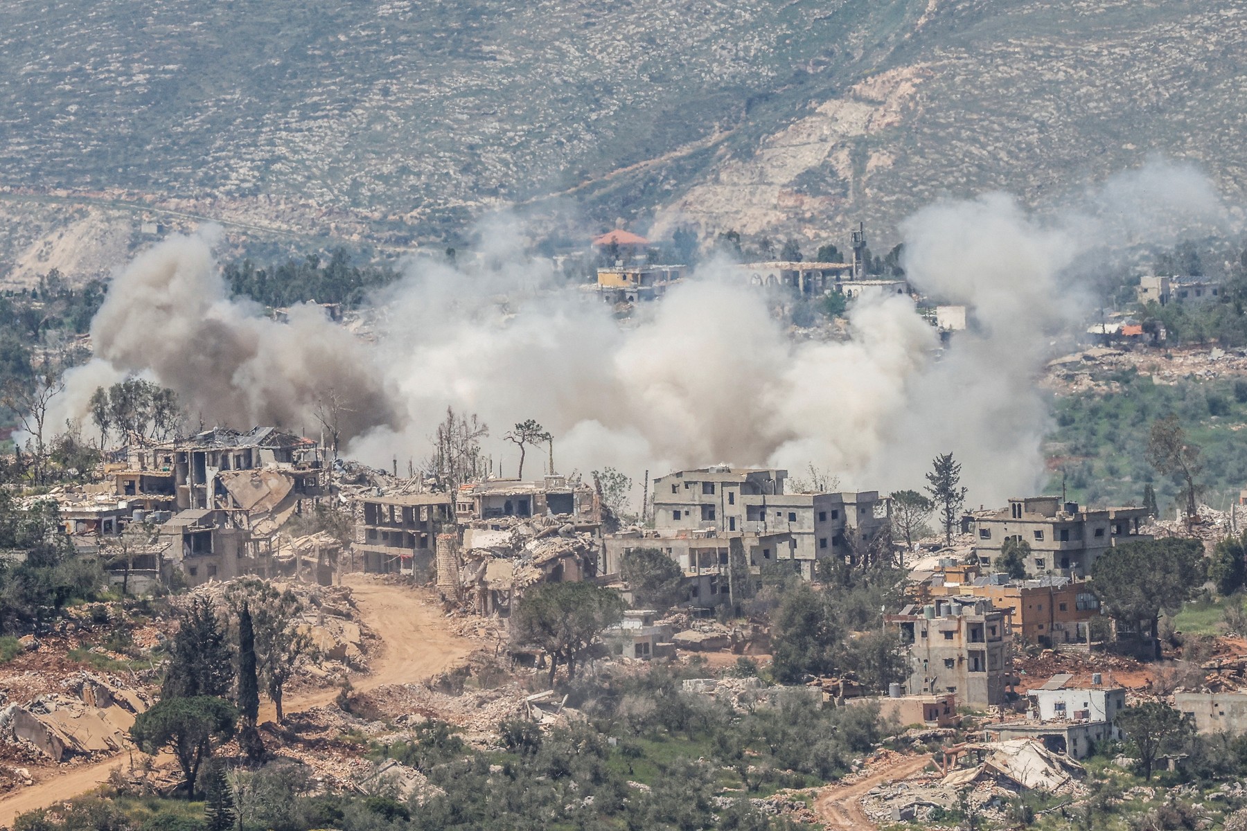 Smoke rises following an Israeli explosion in southern Lebanon near the border as seen from the Upper Galilee in northern Israel on April 27, 2026.