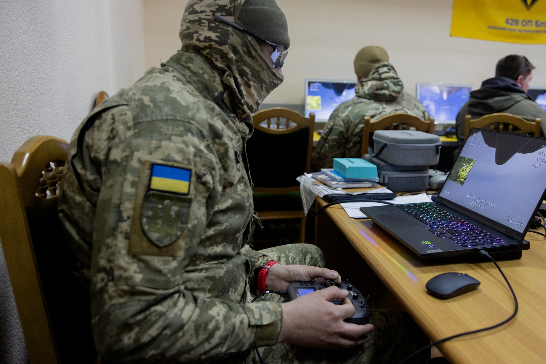 Members of the private air defense training group take part in simulator exercises in the training center's classroom April 8, 2026, amid the Russian invasion of Ukraine