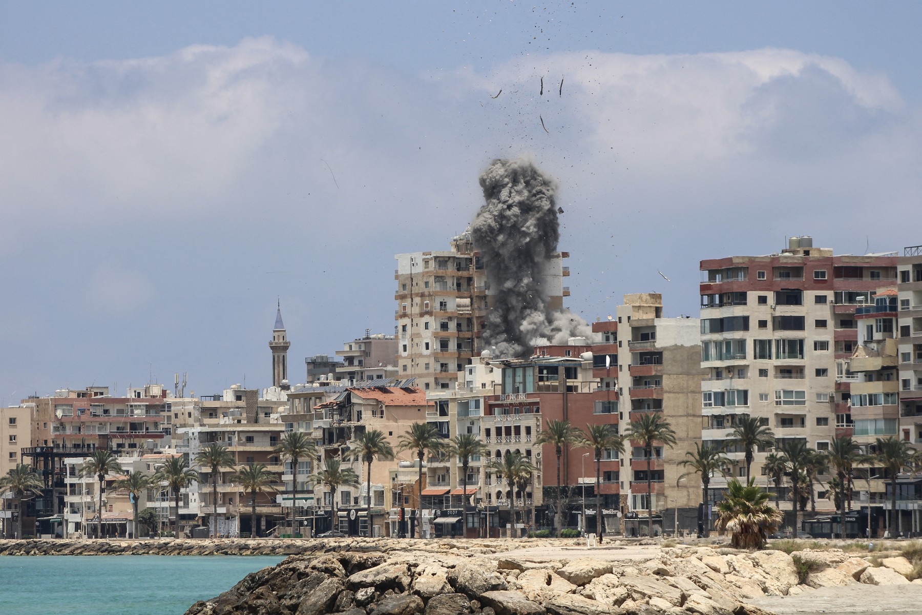 Smoke rises following an Israeli airstrike in Tyre on June 9, 2026.