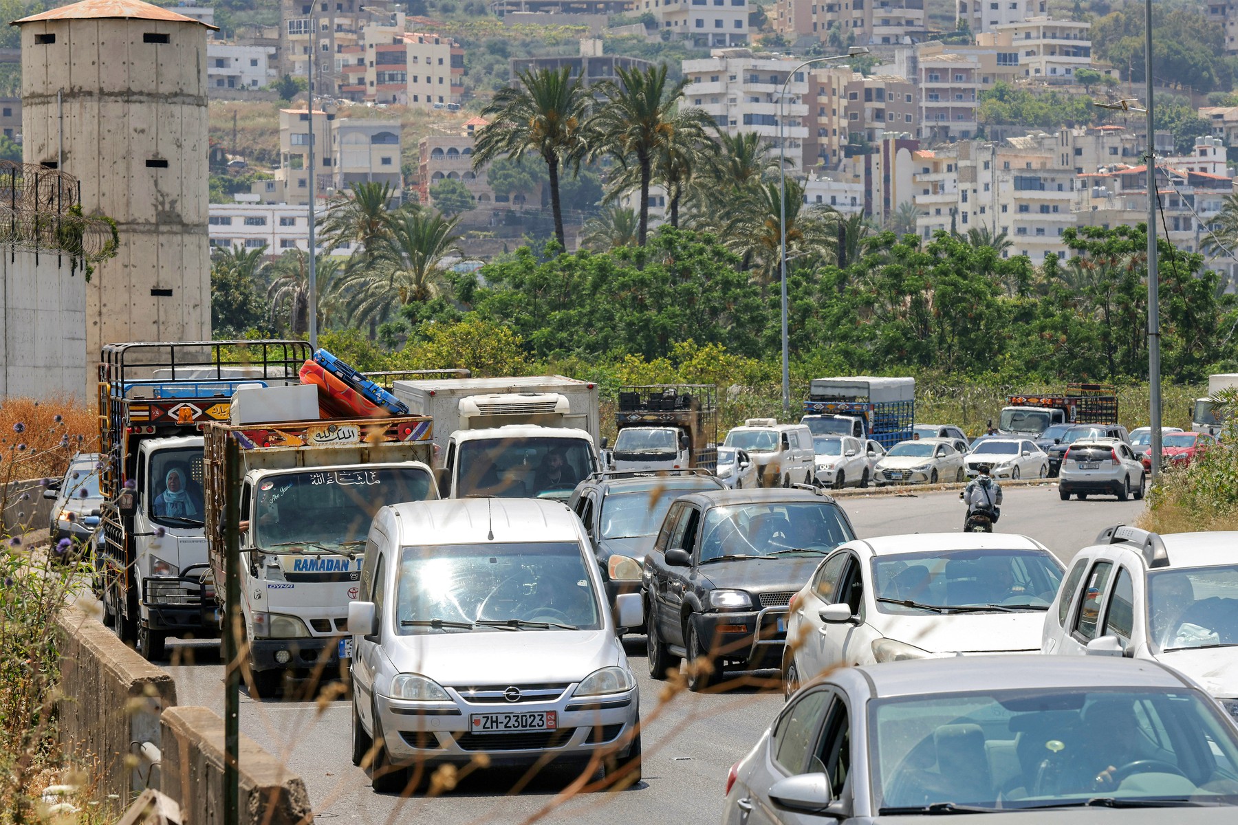 Vehicles wait in traffic as people fleeing from Tyre in southern Lebanon after Israel's evacuation warning