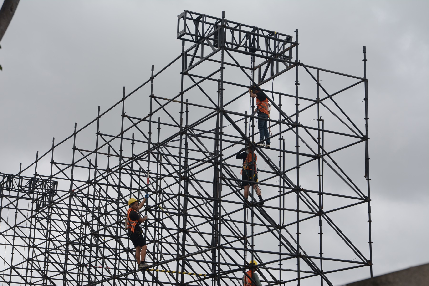 Workers are seen working on a removed installation ahead of the arrival of Super Typhoon Bavi at West Bund, Shanghai, China, on July 11, 2026.