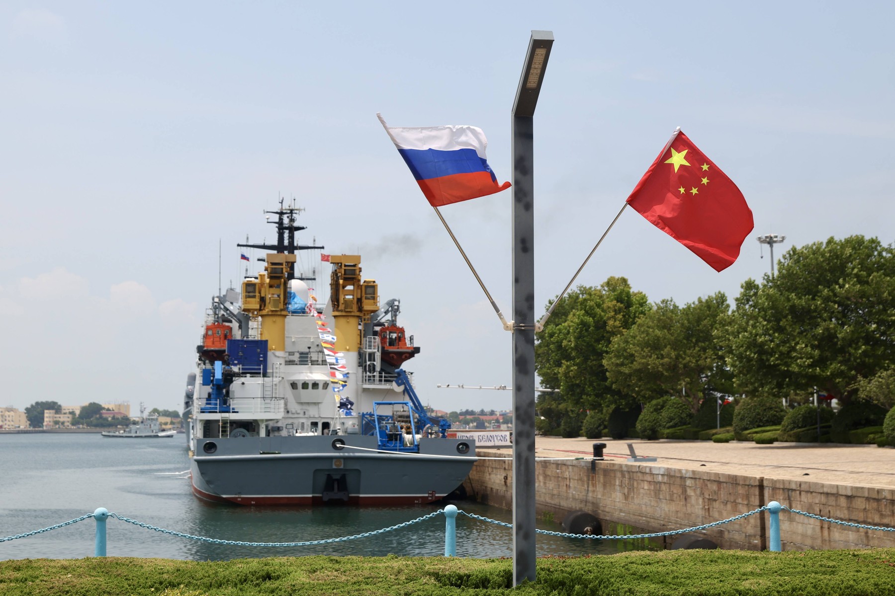 QINGDAO, CHINA - JULY 06: Flags of China and Russia hang at a military port during the Joint Sea-2026 exercise between China and Russia on July 6, 2026.