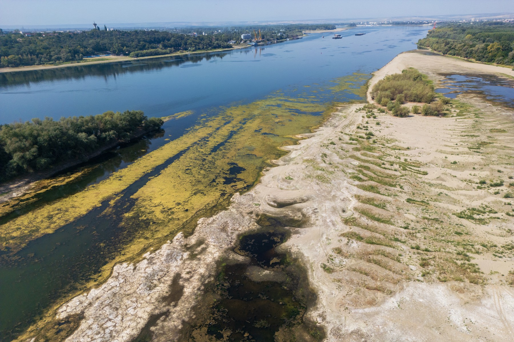 This aerial photograph shows the low water level of the Danube River near Vidin, Bulgaria, on August 5, 2026