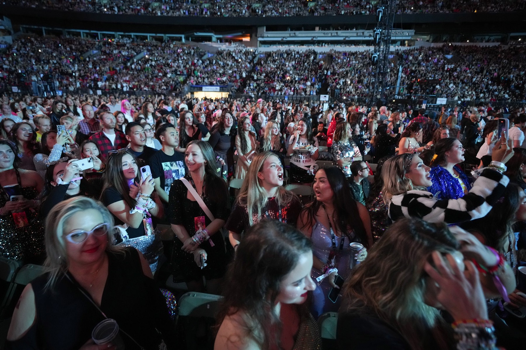 December 6, 2024, Vancouver, Bc, CANADA: Fans sing while watching Gracie Abrams perform as the opening act before Taylor Swift
