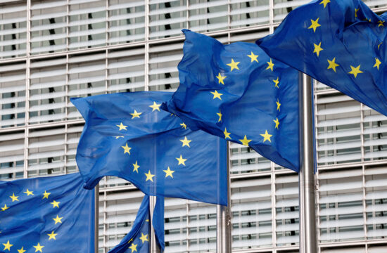 FILE PHOTO: European Union flags flutter outside the EU Commission headquarters in Brussels, Belgium