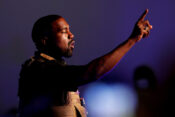 FILE PHOTO: Rapper Kanye West makes a point as he holds his first rally in support of his presidential bid in North Charleston