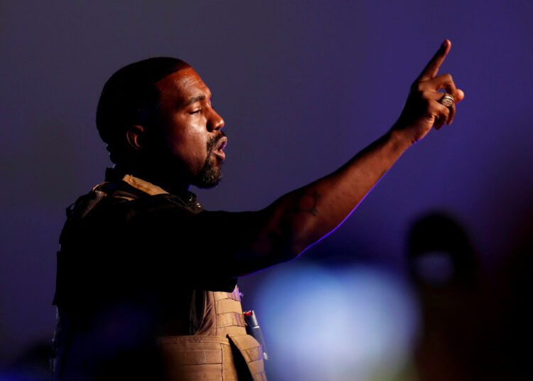 FILE PHOTO: Rapper Kanye West makes a point as he holds his first rally in support of his presidential bid in North Charleston