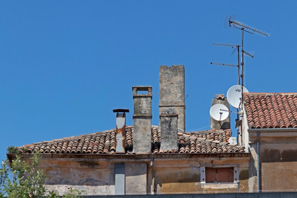 chimneys, aerials and satellite dishes, old town, Porec, Istria, Croatia