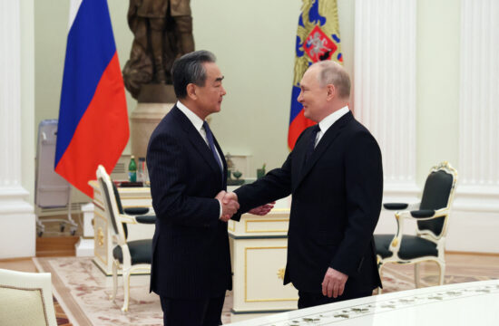 Vladimir Putin in Wang Yi