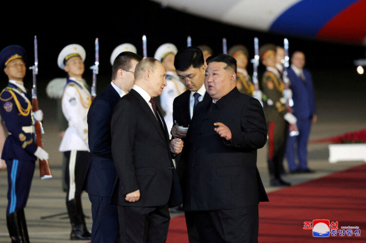 Vladimir Putin in Kim Džong Un