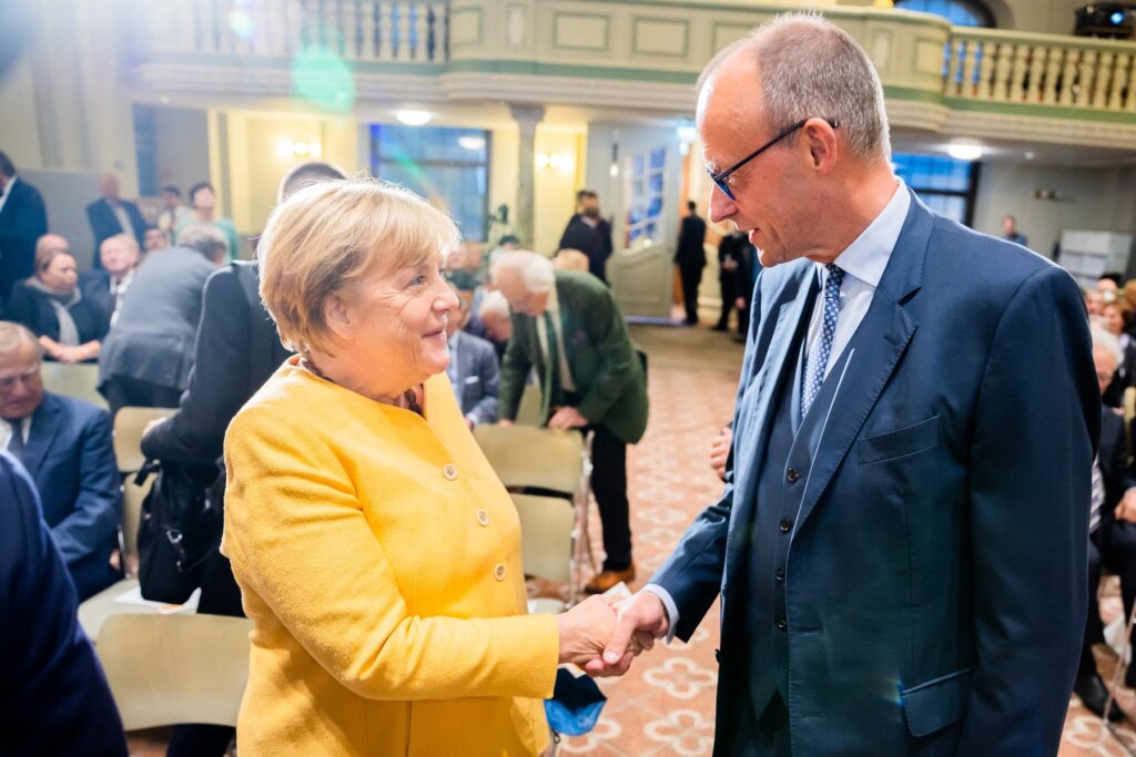 Angela Merkel in Friedrich Merz