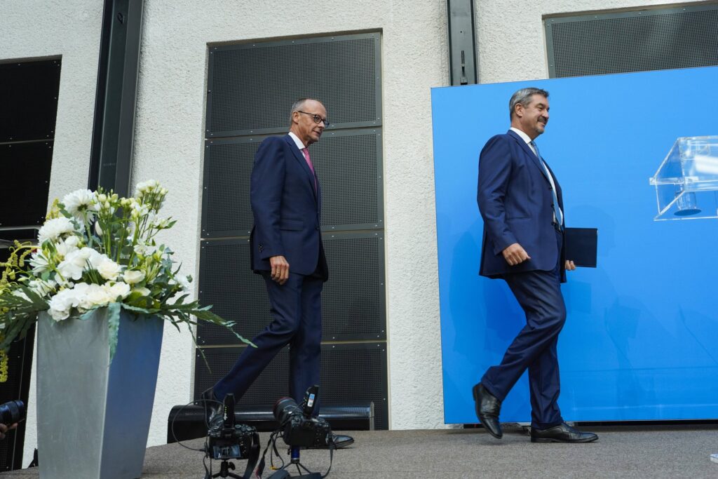 Friedrich Merz in Markus Söder na novinarski konferenci v Berlinu 